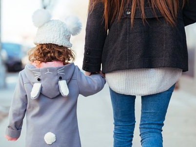 Mom holding the daughter