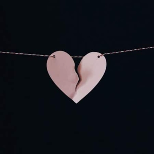 Broken paper heart hanging